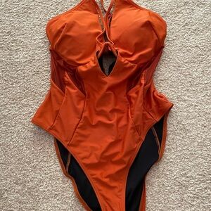 Very cute burnt orange, strappy  one piece swimsuit